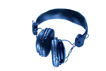 Fototapeta na wymiar Headphone on blue color. Isolated on white background.