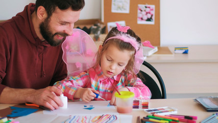 Fototapeta premium art kindergarten teacher child handmade concept. education for talented children. funny and interesting lessons.