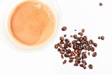 Cold Dried Coffee Beans Next To Hot Coffee Drink Top View
