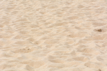 Fototapeta na wymiar Close up sand pattern on the beach 