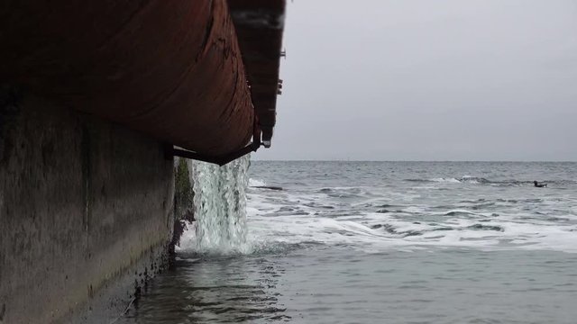 Wastewater. Discharge of sewage into the sea. City collector.
