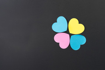 Heart papers on blackboard with copy space for text message. Love concept.