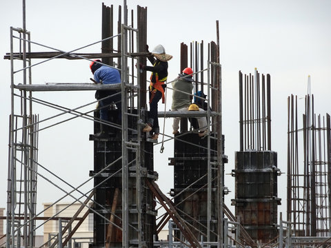 Reinforcement concrete column under construction at the construction site. Fabricated and constructed by workers.  