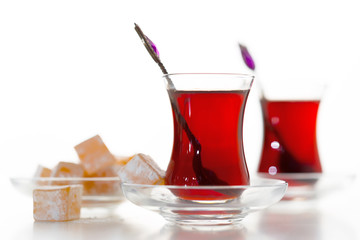 Turkish tea in traditional glass isolated on white background