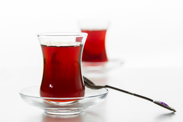 Turkish tea in traditional glass isolated on white background