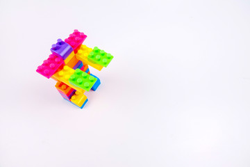 Plastic building blocks isolated on white background