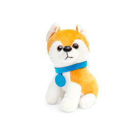 Soft toy dog on white background.