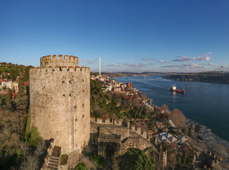 Fototapeta na wymiar Aerial view of Rumeli Castle and Fatih Sultan Mehmet Bridge in Istanbul Turkey