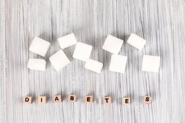 cubes of sugar and text diabetes