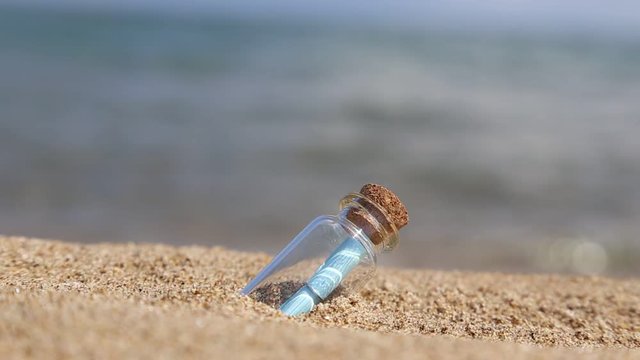 message in a bottle on beach