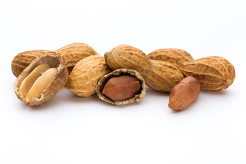 Dried peanuts on the white background.