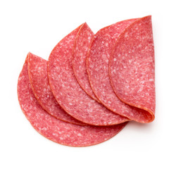 Salami slices isolated on the white background.