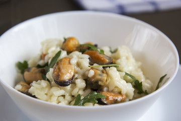 Risotto with mussels. Italian traditional food.