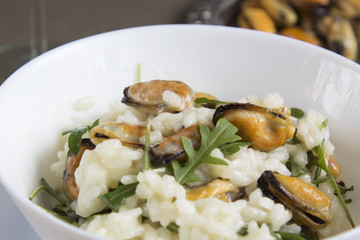 Risotto with mussels. Italian traditional food.