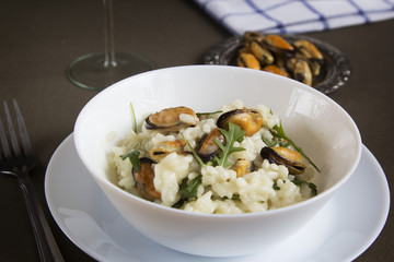 Risotto with mussels. Italian traditional food.