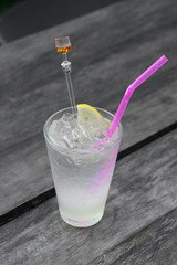 Iced Lemon juice glass on table.