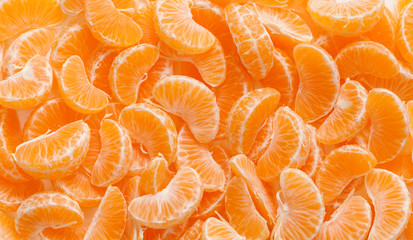 Background of peeled slices of Mandarin oranges