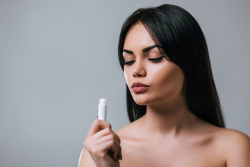 Fototapeta premium Beautiful woman on grey background