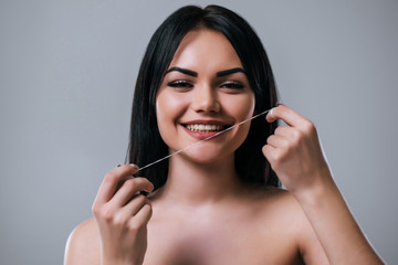 Beautiful woman on grey background