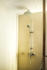 Shower cabin with fixed sprinkler