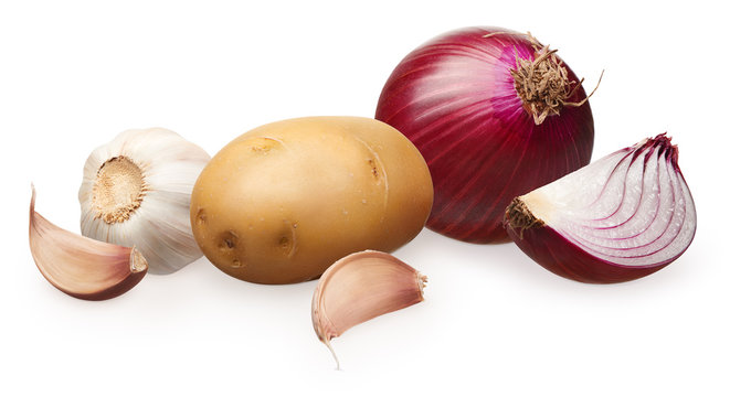 Potato with half, onion with slice and garlic with cloves