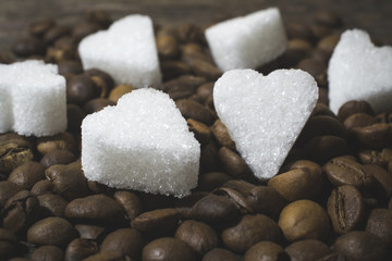 sugar heart with coffee beans background abstract with copyspace