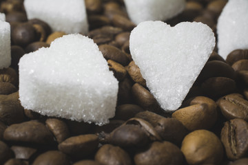 sugar heart with coffee beans background abstract