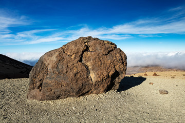 Fototapeta na wymiar Teide National Park, Tenerife, Canary Islands - A view of `Teide Eggs', or in Spanish `Huevos del Teide'. These accretion balls form as pieces solidified lava roll over a still molten surface.