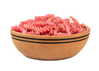 Red pasta fusilli in bowl