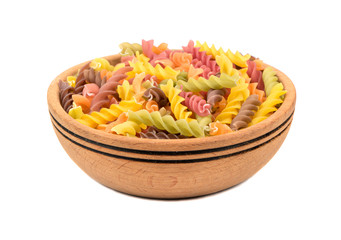 Colorful fusilli pasta in bowl