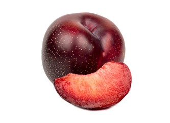 Red plum with slice