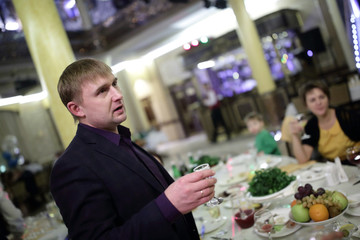 Man with glass of vodka