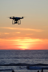 Obraz na płótnie Canvas Drone Flying at sunset moment