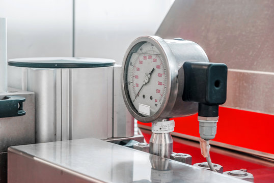 Manometer on a shining tube. Equipment for food industry
