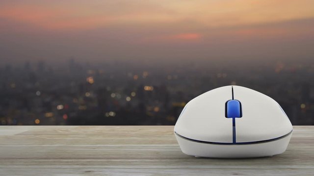 Hammer and wrench and house icon with wireless computer mouse on wooden over blur of cityscape on warm light sundown, Home service concept
