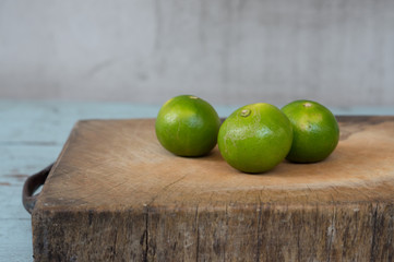 Green lime on wood board.