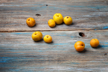 yellow fruits on a blue wooden background