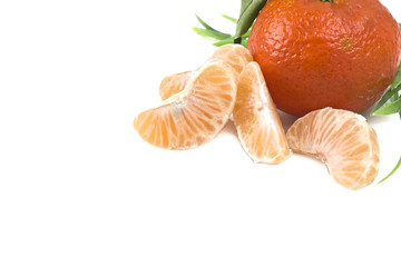 Mandarin or Tangerine fruit with leaves on a white background