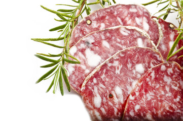 pork salami sliced on a white background
