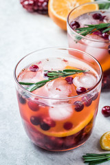 Red wine cranberry citrus pomegranate cocktail. Selective focus, copy space. 