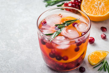 Festive cranberry citrus pomegranate drink. Selective focus, copy space. 