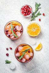 Winter holiday cranberry citrus pomegranate sangria. Top view, space for text.