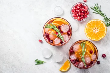 Foto op Plexiglas Festive cranberry citrus pomegranate cocktail. Top view, space for text. © irina
