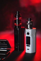 Electronic cigarette over a dark background.
