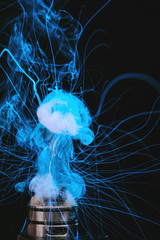 Electronic Cigarette vape explosion. cloud of vapor