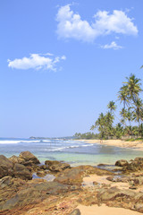 Fototapeta na wymiar Beautiful view of the tropical beach of Sri Lanka on a sunny day