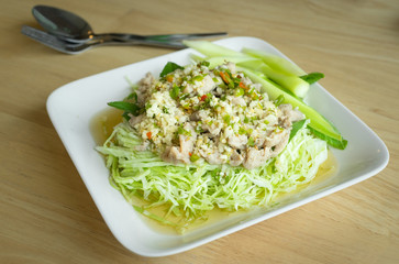 Boiled pork with lime,chili and garlic sauce.