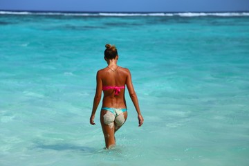girl in thong on a tropical beach