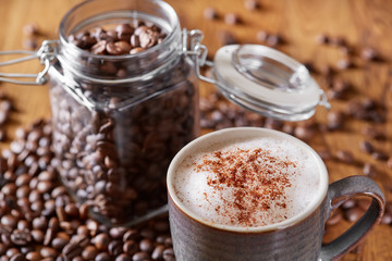 Aroma coffee chocolate cookies and spices on the wooden table. Dark wooden background. Top view. Close. Closeup.