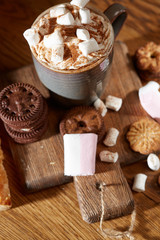 Aroma coffee candy chocolate cookies and spices on the wooden table. Christmas sweets. Dark wooden background. Top view. Close. Closeup.